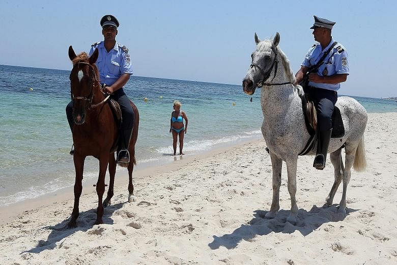 Tunisia has deployed about 3,000 armed policemen in hotels and on beaches to protect tourists, following an Islamic militant's deadly rampage at the popular tourist resort of Sousse.