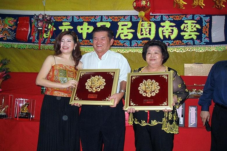 Mr Paul Kok Kuan Pow reportedly runs more than 20 coffee shops in Singapore. Mr Tan Han Swee and his wife, Madam Yiap Moi Hiang, at a Hungry Ghost Festival event in 2004. Yong Xing Coffee Shop at Bukit Batok Street 11 (left) is a popular dining spot 