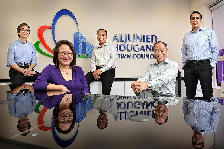 Aljunied GRC MPs from the Workers' Party (from left) Chen Show Mao, Sylvia Lim, Muhamad Faisal Abdul Manap, Low Thia Khiang and Pritam Singh at their town council office in Hougang.