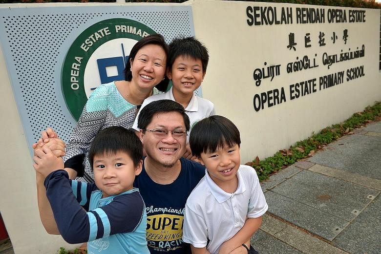 Ms Sharon Lim with her husband Fred Then and their sons (clockwise from top) Christopher, 10; Ian, eight; and Ethan, six.