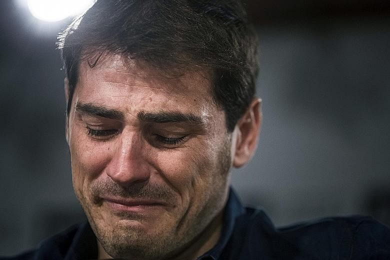 Real Madrid goalkeeper Iker Casillas is moved as he addresses a farewell press conference at the Santiago Bernabeu stadium in Madrid yesterday. Casillas, who joined Real's youth academy in 1990 and played 725 games for the club, will join Portuguese 
