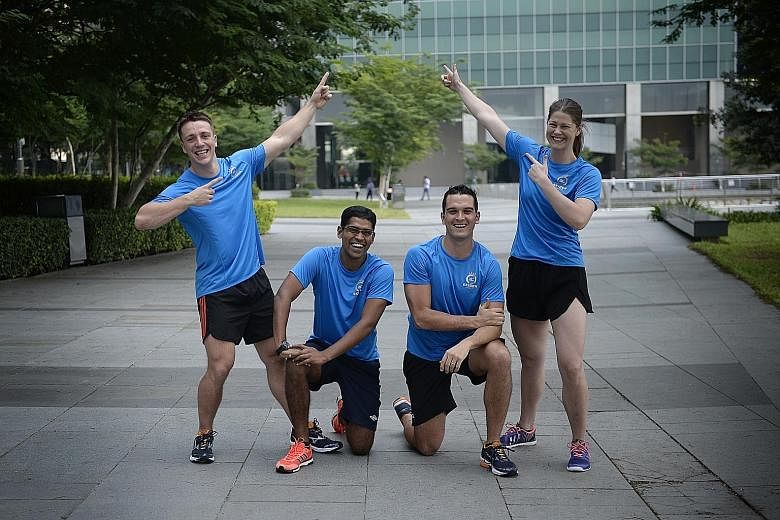 (From left) Sam Brennan, 29; Seishen Gerard, 28; Declan Halpin; 29; and Katherine Macfarlane, 27, the four physiotherapists who are undertaking the Mizuno Ekiden, at The Promontory@ Marina Bay. They will each run 5.3km.