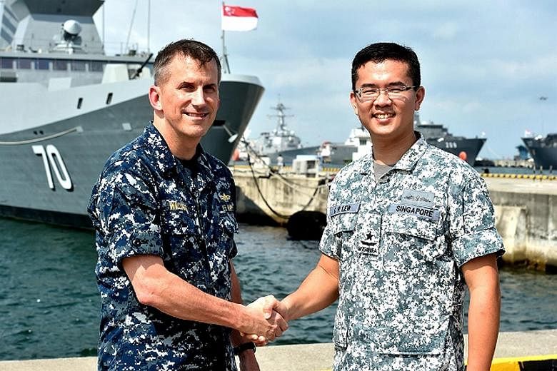 RSN Fleet commander Lew Chuen Hong (right) meeting US Navy Commander Logistics Group Western Pacific Charles Williams yesterday.