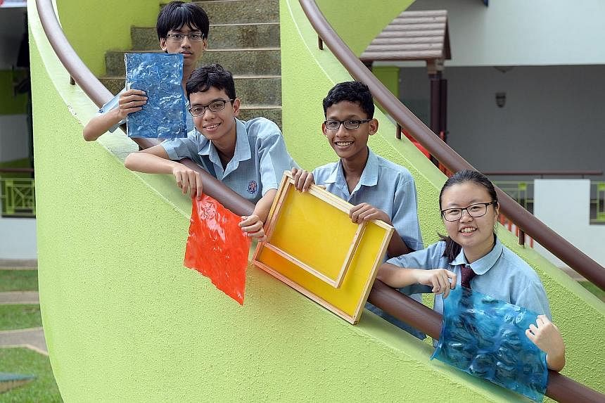 Bukit View Secondary students (from left) Law Zehnwen, Yasmin Sim, Jeralyn Neo and Evangeline Bernice Meshach, all 15, won in the food category with a self-heating lunch box powered by energy from cycling.