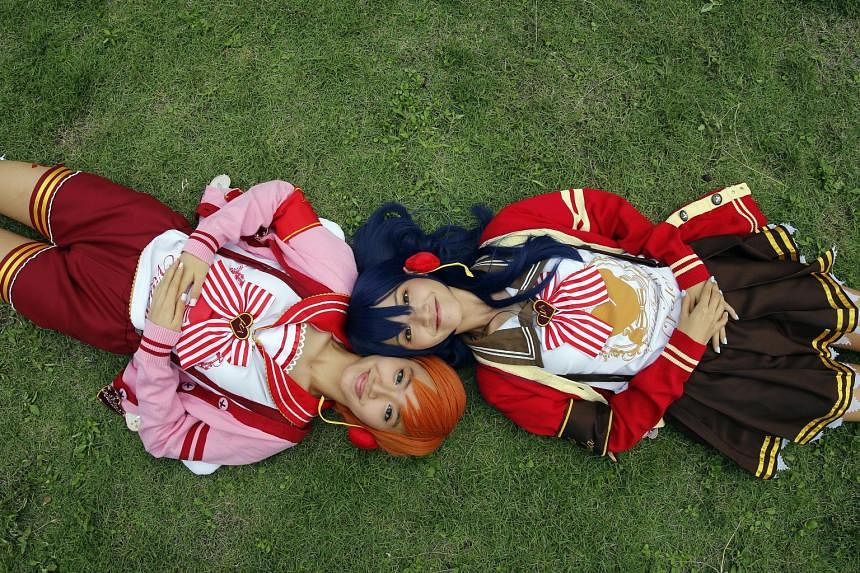 Civil servant Zephyus Chou and IT executive Maria Sim (both above) role-played characters from the Japanese novel series Vampire Hunter D to win a trip to the World Cosplay Summit in Japan this month. Cosplayers (left, below and bottom) dressed up as