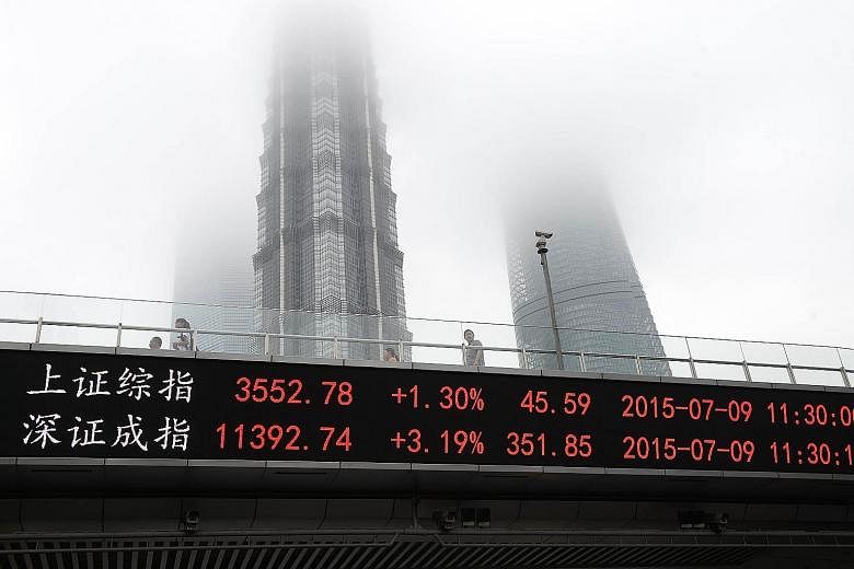 Founder Wong Kok Hoi said "many of our positions performed strongly" in APS' run this year. A screen, displaying data from the Shanghai Composite Index (top) and the Shenzhen benchmark, mounted on an overpass in Shanghai. The recent stock plunge in C