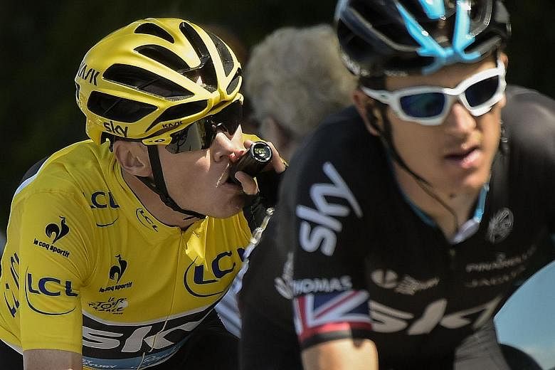 Chris Froome (left), riding behind Geraint Thomas during the 181.5km eighth stage of the Tour de France, has spoken about "clowns" who try to analyse figures and make allegations.