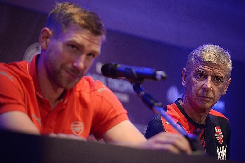 Arsene Wenger (right) is not ruling out any other new signings - as long as they can further strengthen the team - while Per Mertesacker insists that the Gunners must get off to a good start, unlike last season.