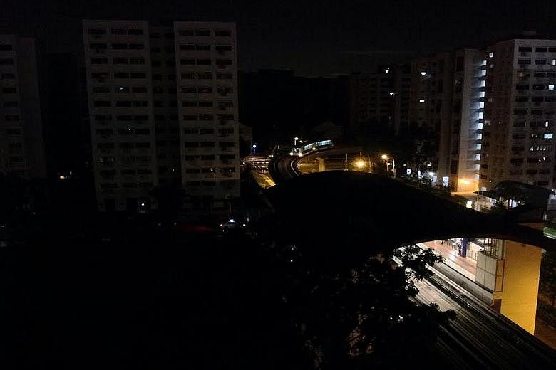 Flats in Bukit Panjang seen during Tuesday night's blackout. A total of 19 blocks in the area were affected, with the electricity supply disruption occurring at 10.08pm and power being fully restored by 11.18pm.