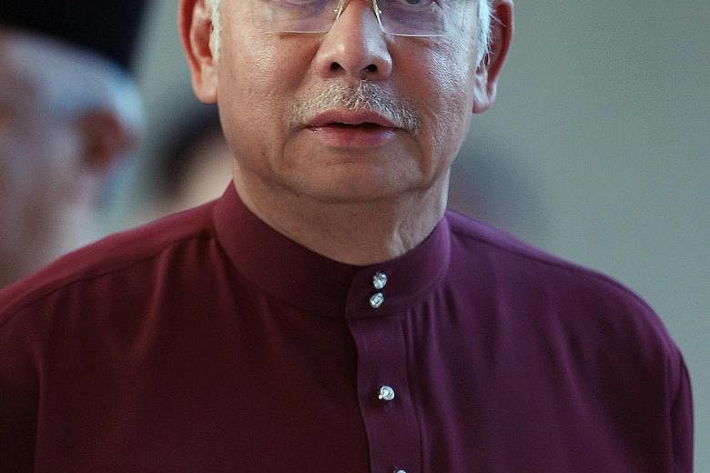 Mr Najib Razak has dismissed reports implicating him in a graft case as "baseless smears".