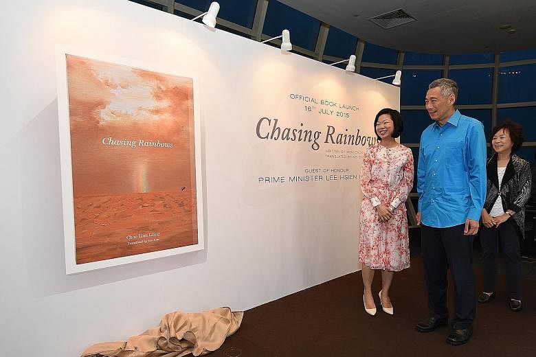 Prime Minister Lee Hsien Loong, Minister of State for Education and Communications and Information Sim Ann and Madam Choo Lian Liang at the launch of Chasing Rainbows yesterday.