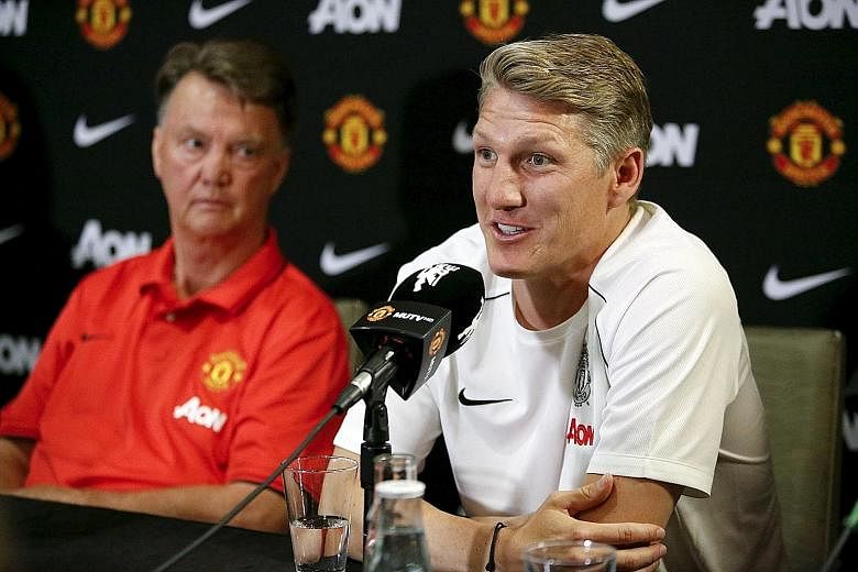 Bastian Schweinsteiger (right), with manager Louis van Gaal, brings plenty of experience to Manchester United from his years as a stalwart with Bundesliga champions Bayern Munich and World Cup holders Germany. But van Gaal has told his new signings t