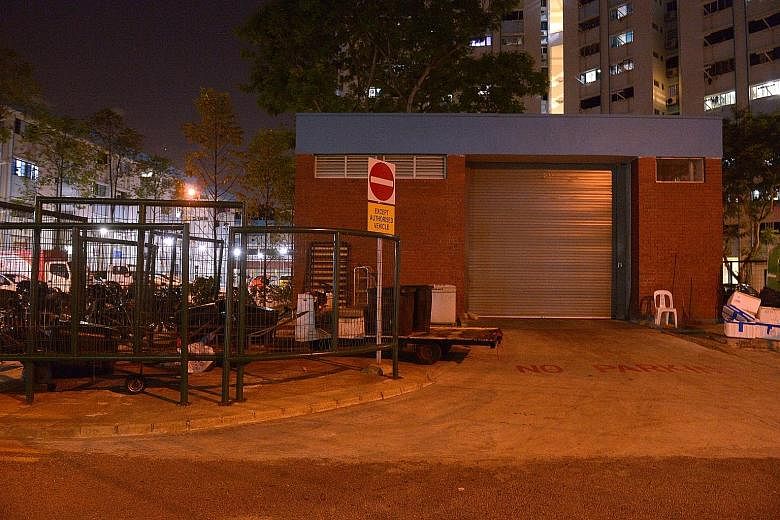A cleaner resting in the bin centre at Block 125, Pending Road in Bukit Panjang. Like other cleaners found occupying bin centres at some HDB estates, he denies living in one. He said that it is a convenient resting place. "In the afternoons, when we 