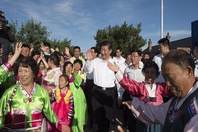 Chinese President Xi Jinping visited Yanbian, which is nestled in the north-eastern corner of the sensitive border with North Korea and is populated by ethnic Koreans, state media reported yesterday. He arrived on Thursday, wading into rice fields, c