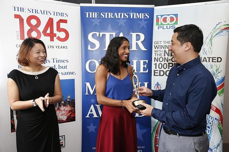 Far left: Shanti Pereira receiving the award from ST sports editor Marc Lim for her 200m victory in the SEA Games (left). With them is Celine Tan, marketing manager of F&N.