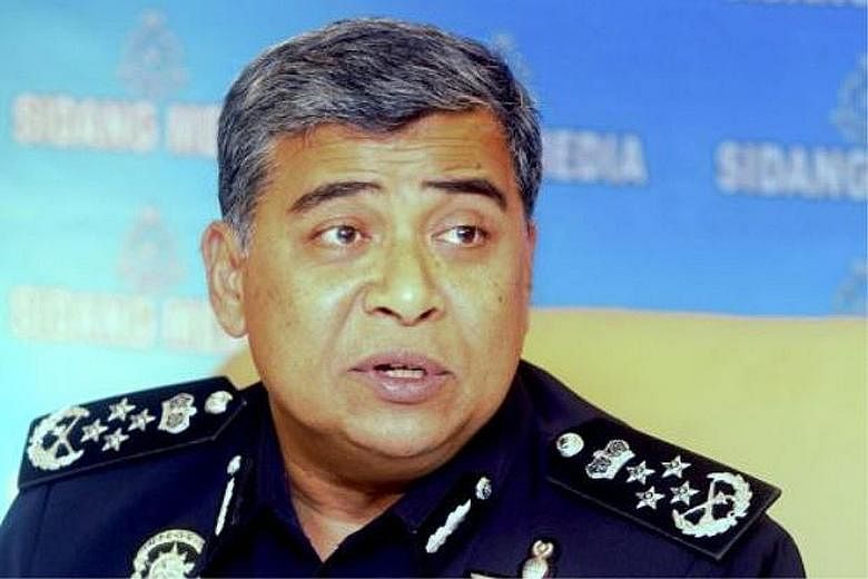 IGP Khalid Abu Bakar said police are investigating a Facebook page which showed a screen capture of an alleged WhatsApp conversation between blogger Papagomo and him.