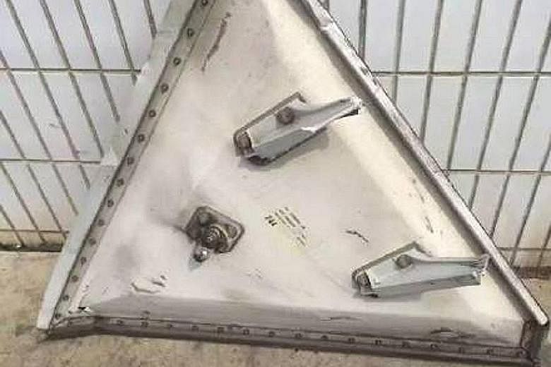 The 60kg metal part that broke off from an Air France jet and hit a factory roof in Shanghai last Monday. No one was hurt in the incident.