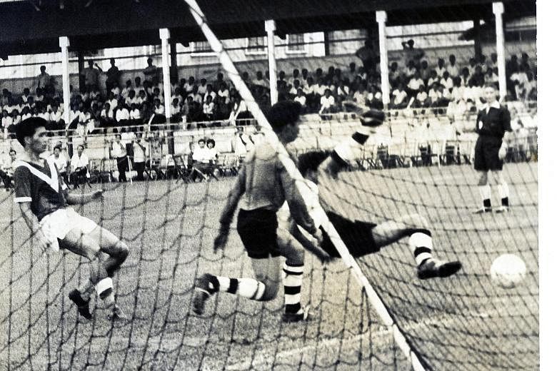 Quah Kim Swee (above), who scored against Pahang in a 1963 match in this photo, was known for his bravery in attempting headers.
