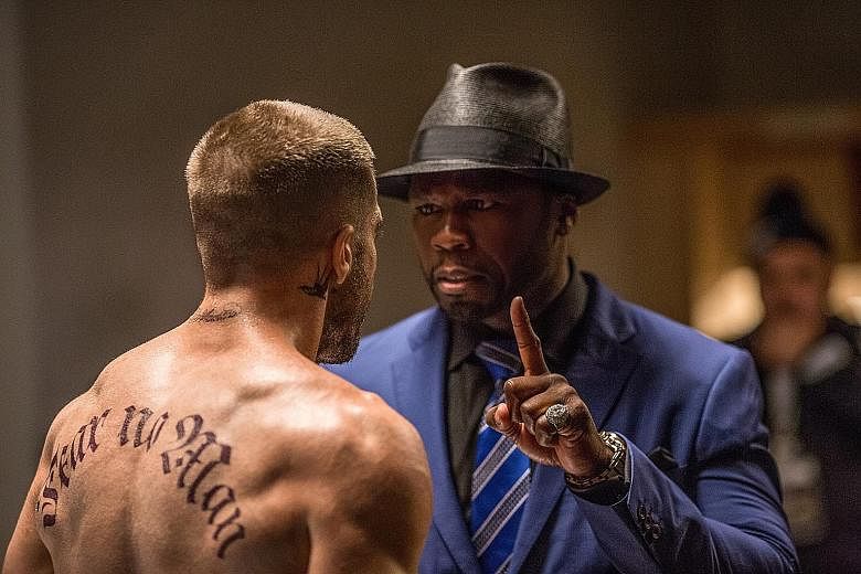Rapper 50 Cent (left) plays the manager of Jake Gyllenhaal's boxer character in Southpaw.