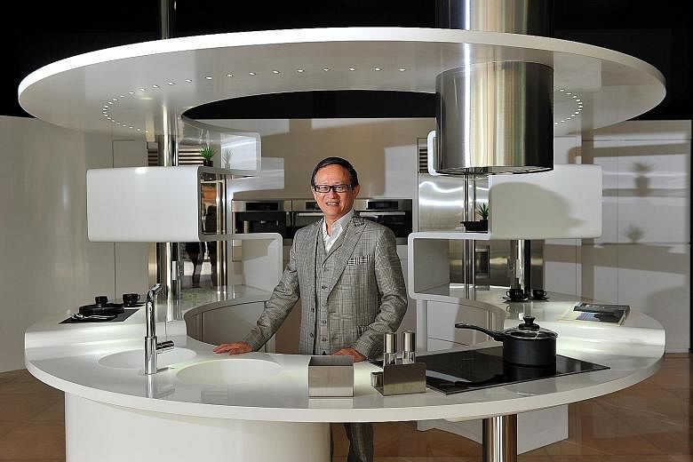Luxx Newhouse Group president Jimmy Tong, 62, with the Acropolis kitchen design, which won the SG Mark Gold Award. The company specialises in the design, fabrication, contract management and distribution of solid-surface materials.