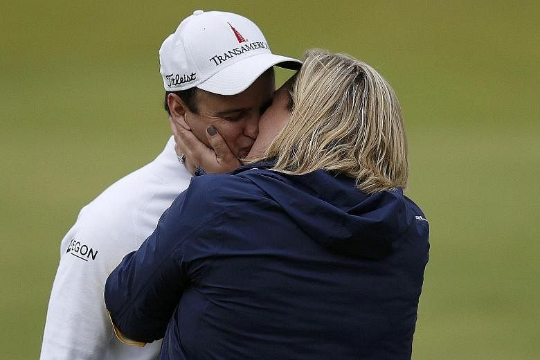 Zach Johnson getting a kiss from his wife Kim Barclay after winning The Open on Monday. The 39-year-old American now has two Majors among his 12 PGA Tour victories.