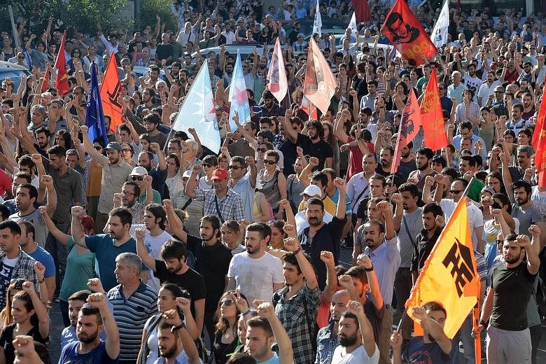 Hundreds of people in Turkey took to the streets on Monday in protest against a suicide attack in a town on the border with Syria. The attack, which killed 31, has been blamed on ISIS extremists.