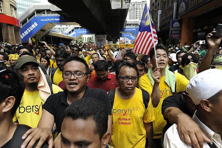 Protesters at a Bersih rally in Kuala Lumpur in 2012. The political activist group is one of the partners named by Anwar, who is in jail, for the upcoming opposition alliance.