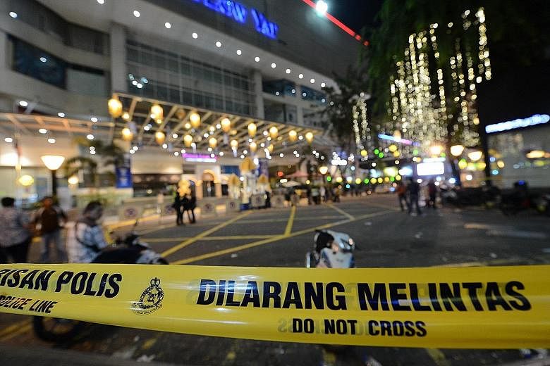 A petty theft at a mobile phone shop in Kuala Lumpur's Low Yat Plaza on July 11 snowballed into days of fighting and racial riots.