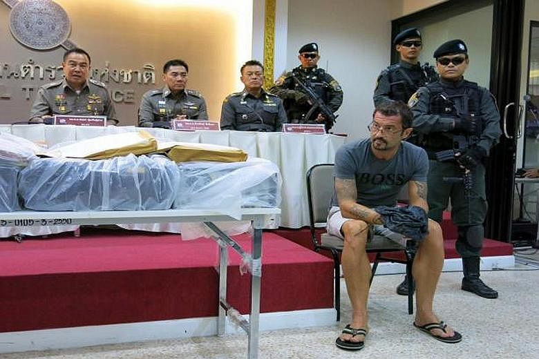 Swiss national Xavier Andre Justo in a photo issued by the Thai police after his arrest. He claimed a deal was reached in Singapore in February on the sale of stolen documents which was followed by discussions on how he would be paid. The group of pe