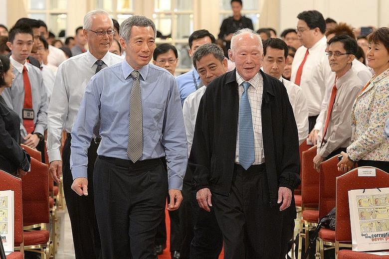 Mourners waiting for Mr Lee Kuan Yew's cortege to pass on March 29. There was a tremendous outpouring of grief, but confidence in Singapore was not shaken. Prime Minister Lee Hsien Loong at a forum earlier this week. Singapore needs to get its econom