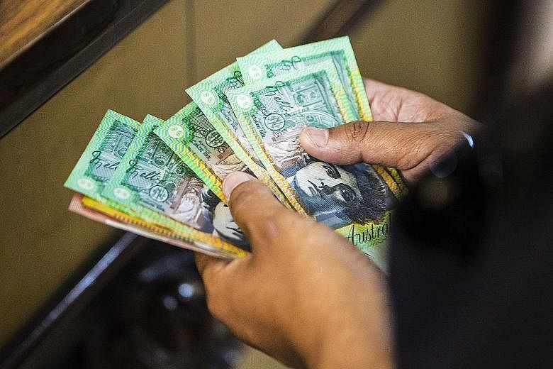 The Aussie dollar has slumped 5.4 per cent this month, making it the worst performer against the greenback among the Group of 10 currencies. It fell to as low as 1.0031 against the Singdollar at the start of July.