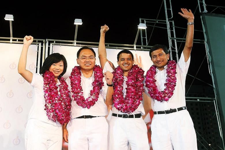 Of the two existing four-member GRCs, only Holland-Bukit Timah GRC will remain the same. At left, its MPs at the 2011 General Election (from left) Ms Sim Ann, Mr Liang Eng Hwa, Mr Christopher de Souza and Dr Vivian Balakrishnan.