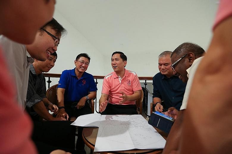 MP Alex Yam (in pink), with key volunteers in the Yew Tee division. The Chua Chu Kang GRC MP is among the MPs affected by the creation of Marsiling-Yew Tee GRC. Residents and observers are keenly watching to see who will be sent to the new GRC, since