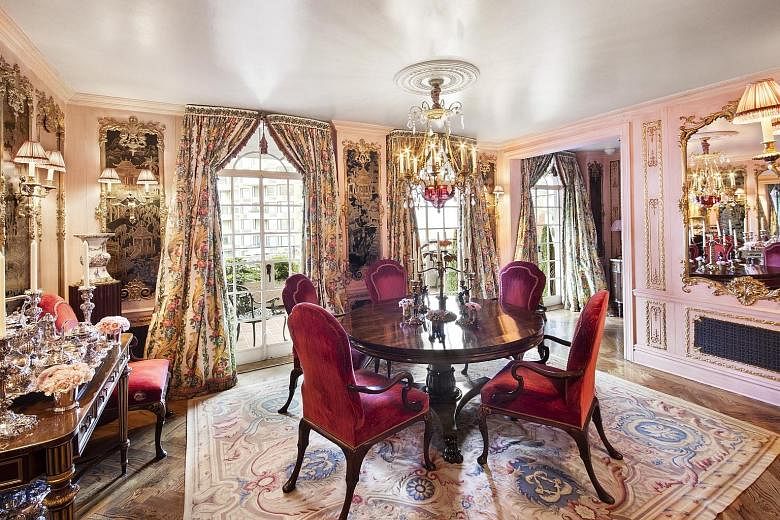 (From top) The formal dining room, the library and Rivers at home in a 2012 picture. The ballroom (right) in the triplex of Joan Rivers. The music room (above) has a high ceiling and gilded antique boiserie panelling.