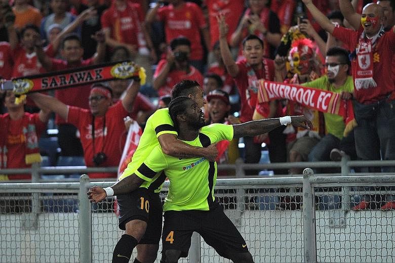 Malaysian second-tier side PKNS' Liberian player Patrick Wleh is the toast of the Malaysia XI fans after opening accounts in the 16th minute against Liverpool in Kuala Lumpur. Jordon Ibe equalised in the 28th minute and there were no further goals as