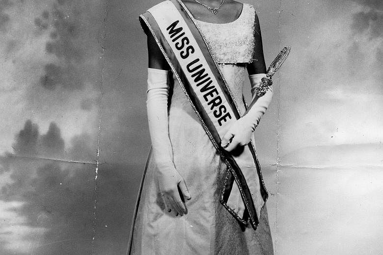 Ms Apasra Hongsakula at a press event in Bangkok for the 2005 Miss Universe pageant. She was just 18 when she took the title in Miami in 1965.
