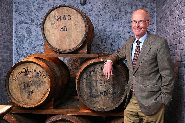 The Macallan's director of super premium whiskies David Cox (left) and The Macallan Rare Cask (above).