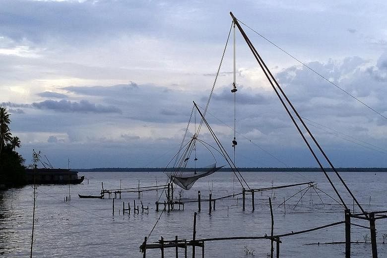 (Above) Diamond-shaped Chinese nets used by fishermen in Kerala. A cabin (left) aboard The Oberoi Motor Vessel Vrinda, Kerala (above). (Left) The Kathakali dance is dramatic and fierce. Vembanad Lake is Kerala's longest, part of the 1,500km network o