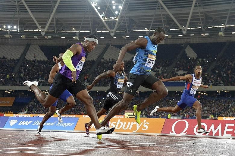 Usain Bolt overcame a slow take-off to edge out Michael Rodgers by 0.03sec to win the 100m in 9.87sec. It sets up an exciting duel with Justin Gatlin next month in Beijing.