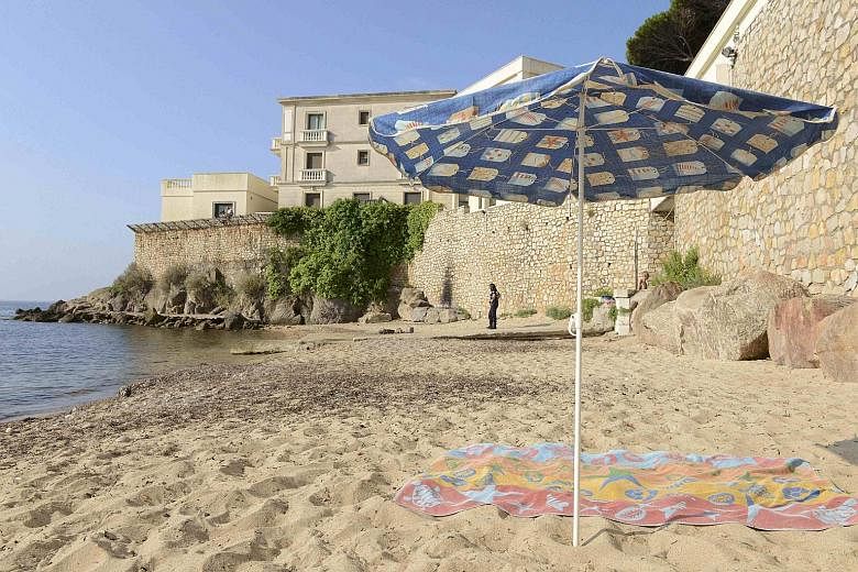 The public beach below the villa owned by King Salman of Saudi Arabia in the Cote d'Azur resort of Vallauris, near Cannes. French police have closed off the area, including access by sea, for reported security reasons during the king's visit, prompti