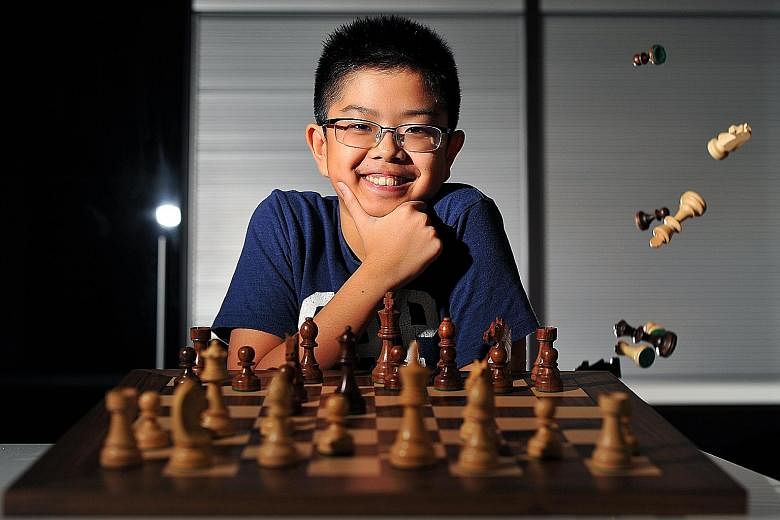 Cyrus Low (above), 13, is Singapore's top under-14 chess player, the ninth best in Asia and the 38th in the world in this age group. To show his commitment to the game, Cyrus gave most of his toys to his younger brother Darius (below, left), with who
