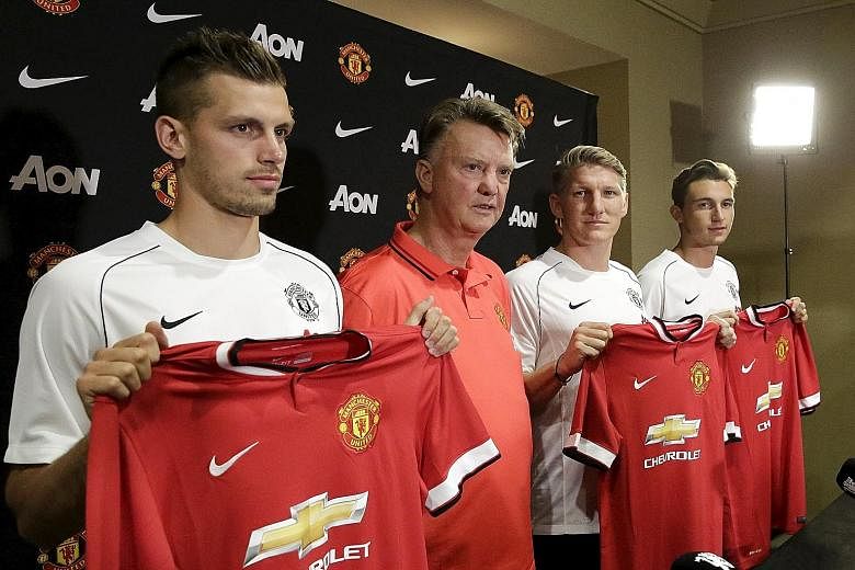 This summer, Louis van Gaal (in red) has brought in new players like (from left) Morgan Schneiderlin, Bastian Schweinsteiger and Matteo Darmian. But the Manchester United manager still craves a game-changer.