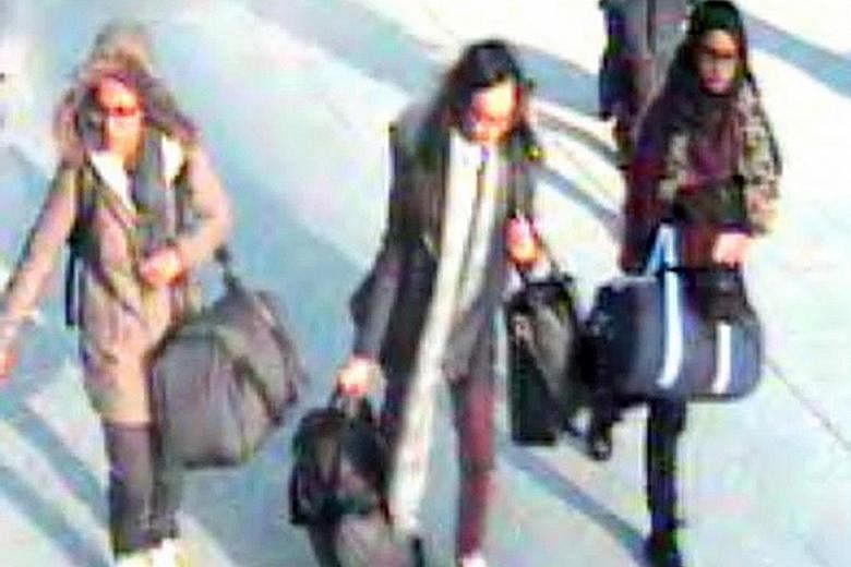 British schoolgirls (from left) Amira Abase, Kadiza Sultana and Shamima Begum at Gatwick airport in February. They were travelling to Syria to become the brides of ISIS fighters.