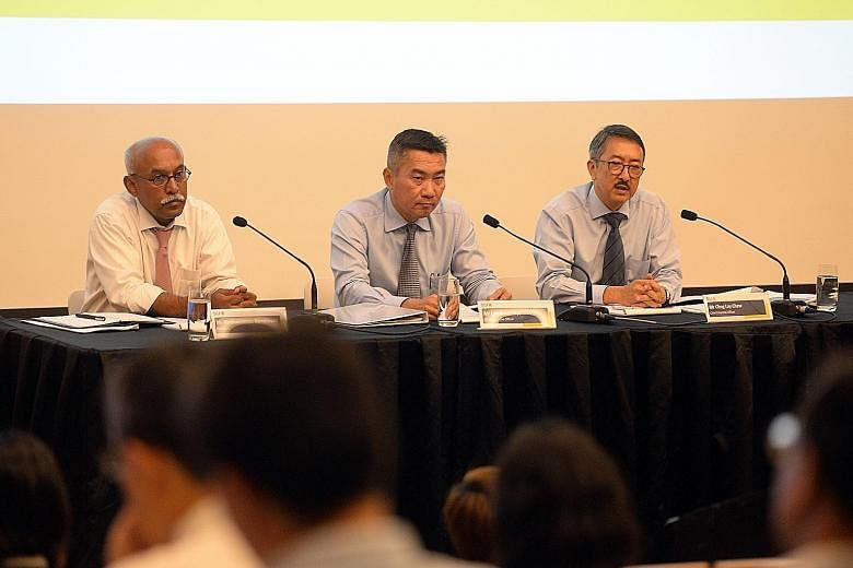 Singapore Exchange executives (from left) Mr Muthukrishnan Ramaswami, the president; CEO Loh Boon Chye; and chief financial officer Chng Lay Chew at yesterday's press briefing.