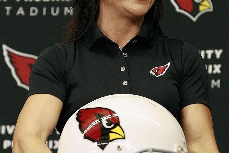 Jen Welter, who will be a Cardinals intern coach, at a press conference on Tuesday in Tempe, Arizona. The 37-year-old says she never thought that she would one day coach in the NFL.