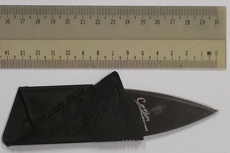 The card knife that got Hairulnizam Hanafi a jail term of three months yesterday. The 30-year-old was found carrying it in his wallet when he went to the State Courts with his father earlier this year.