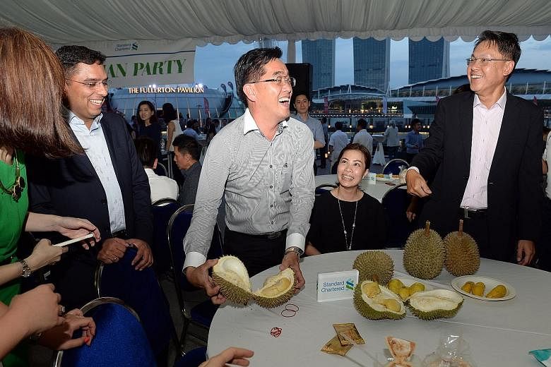 Standard Chartered Bank threw an invitation-only durian party for its clients over two nights earlier this week. The 10th annual durian party, held at Clifford Square, served up a record two tonnes of durians, along with other fruits such as mangoste