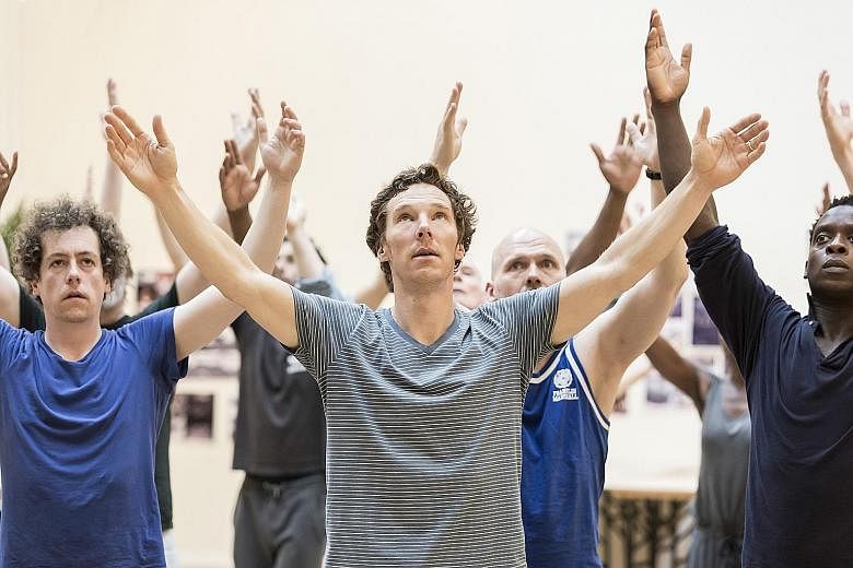 Benedict Cumberbatch (centre) rehearses for his role as the title character in London theatre production Hamlet.