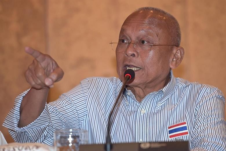 Former deputy prime minister Suthep Thaugsuban (left), who emerged yesterday after a monastic hiatus, said at a press conference that his foundation wants the government to complete reforms before elections, no matter how long that would take.