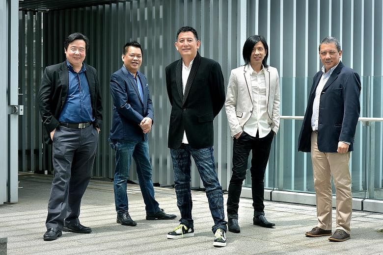 The Sing50 creative committee comprises (from left) conductor Chan Tze Law, finale arranger Indra Ismail, creative director Jeremiah Choy, music director Kenn Chua and Music & Movement CEO Lim Sek.